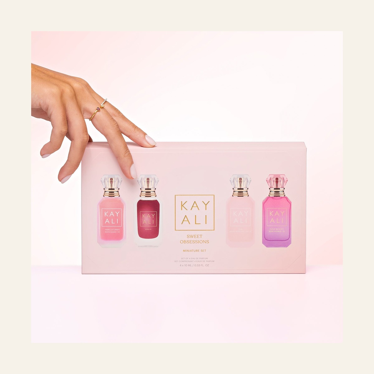 KAYALI Sweet Obsessions pink gift box showing the four included miniature fragrances