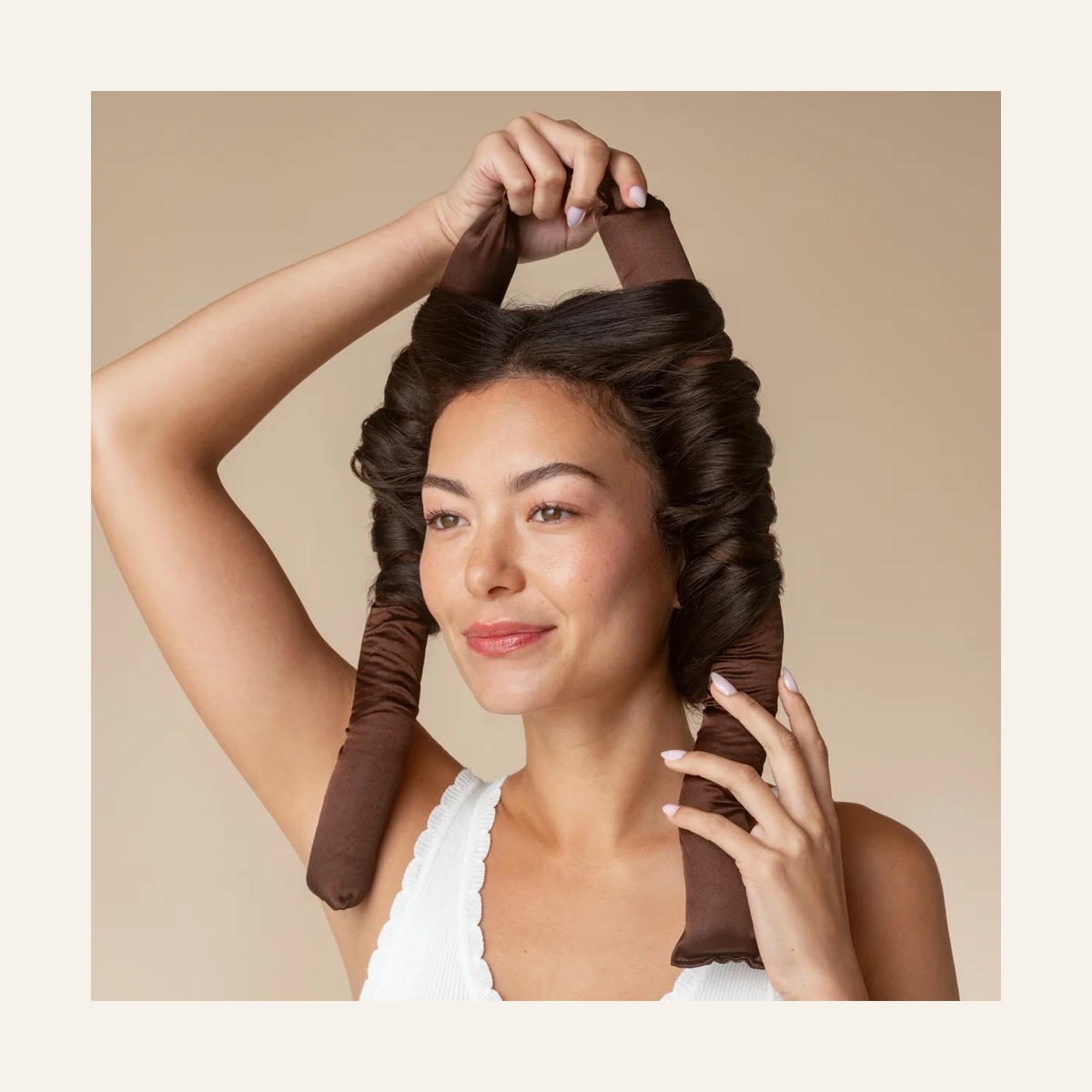 Kitsch Satin XL Heatless Curling Set in Chocolate wrapped around a model’s hair