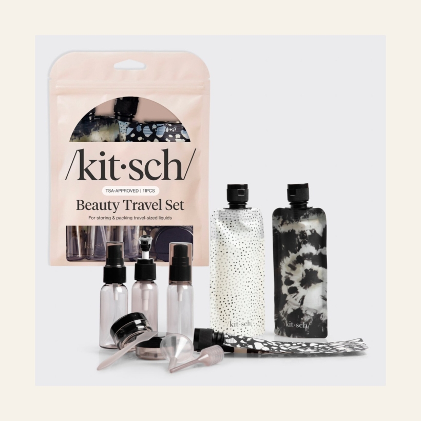 Kitsch Travel Bottles Black and Ivory set with assorted containers beside retail packaging
