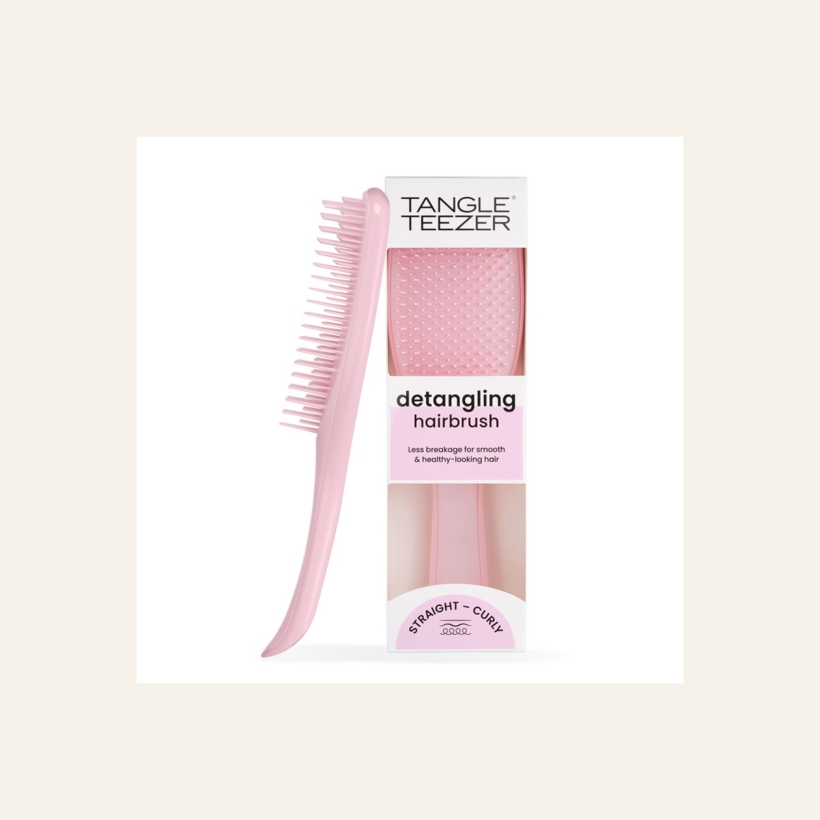 Regular Millennial Pink Tangle Teezer Ultimate Detangler beside its packaging