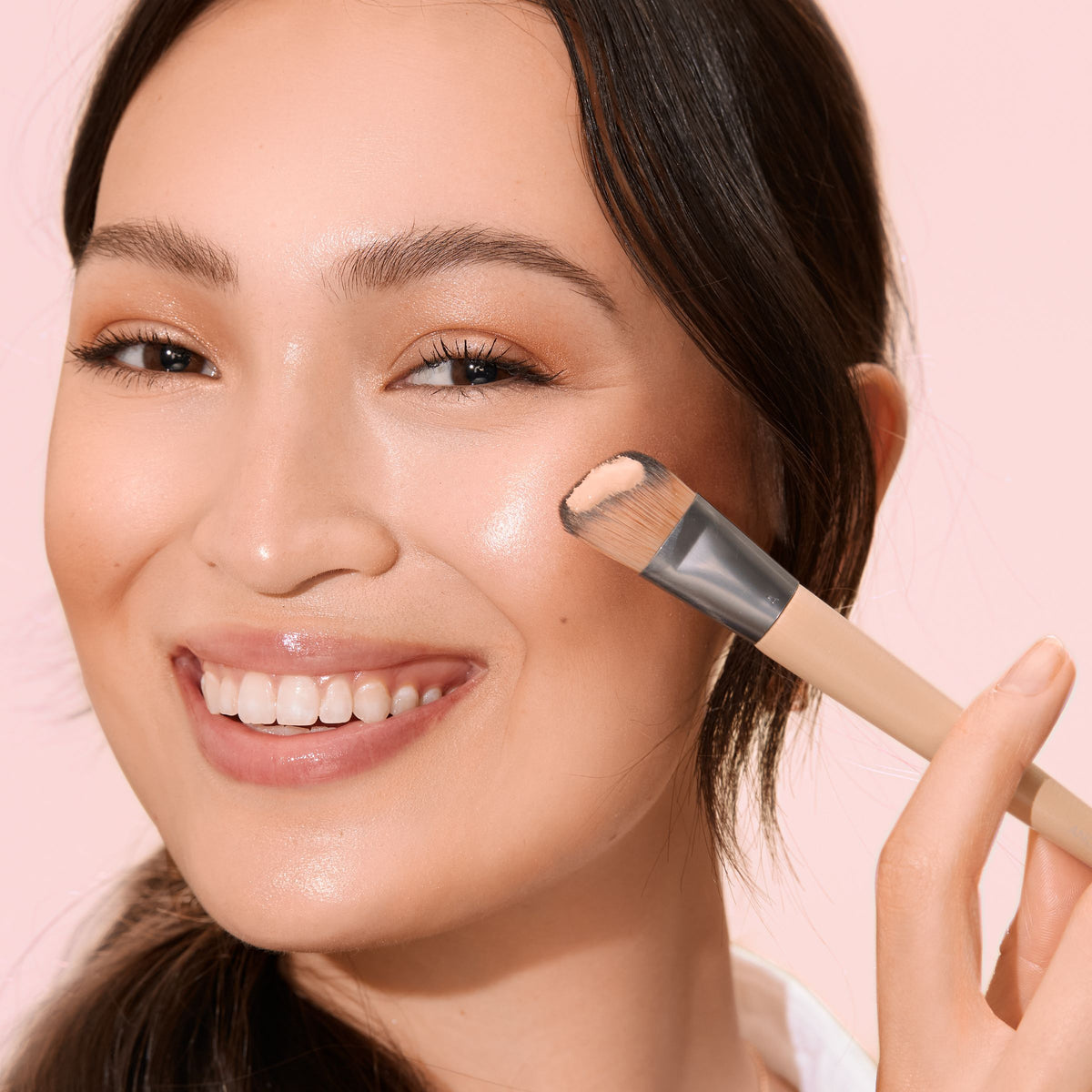 EcoTools angled foundation brush applying foundation to the cheek