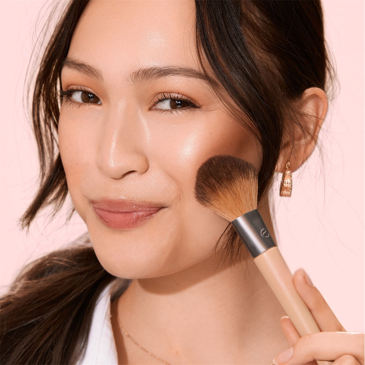 EcoTools full blush brush used for powder application on the cheek